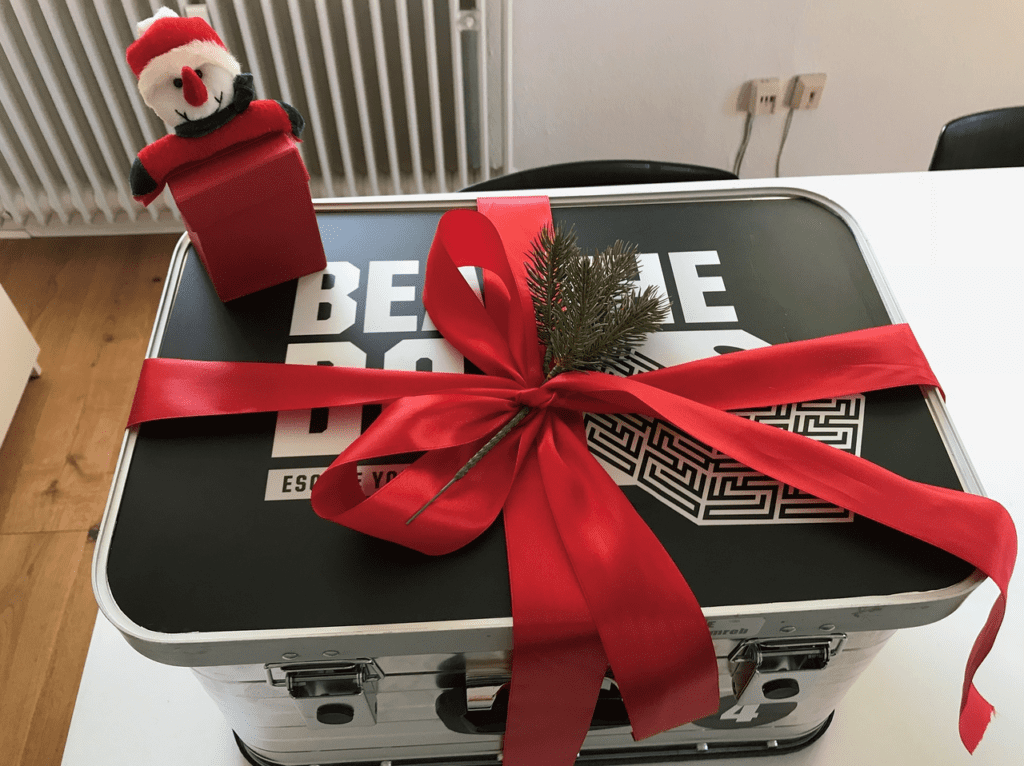 Festively wrapped Beat The Box kit ready for the holiday-themed Rescue Santa team building event.